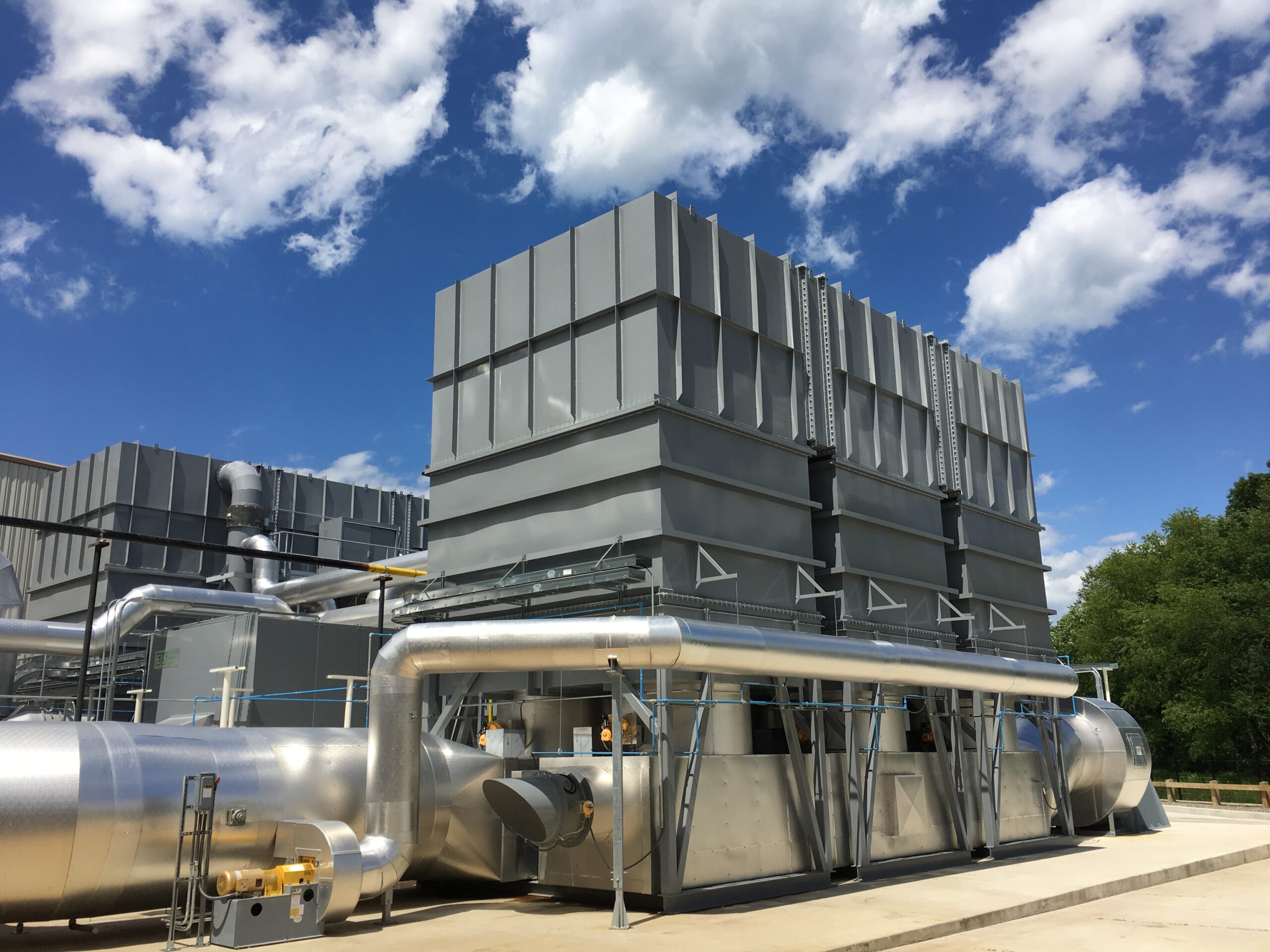 RTO installated on exterior of industrial building treating odor and emissions.