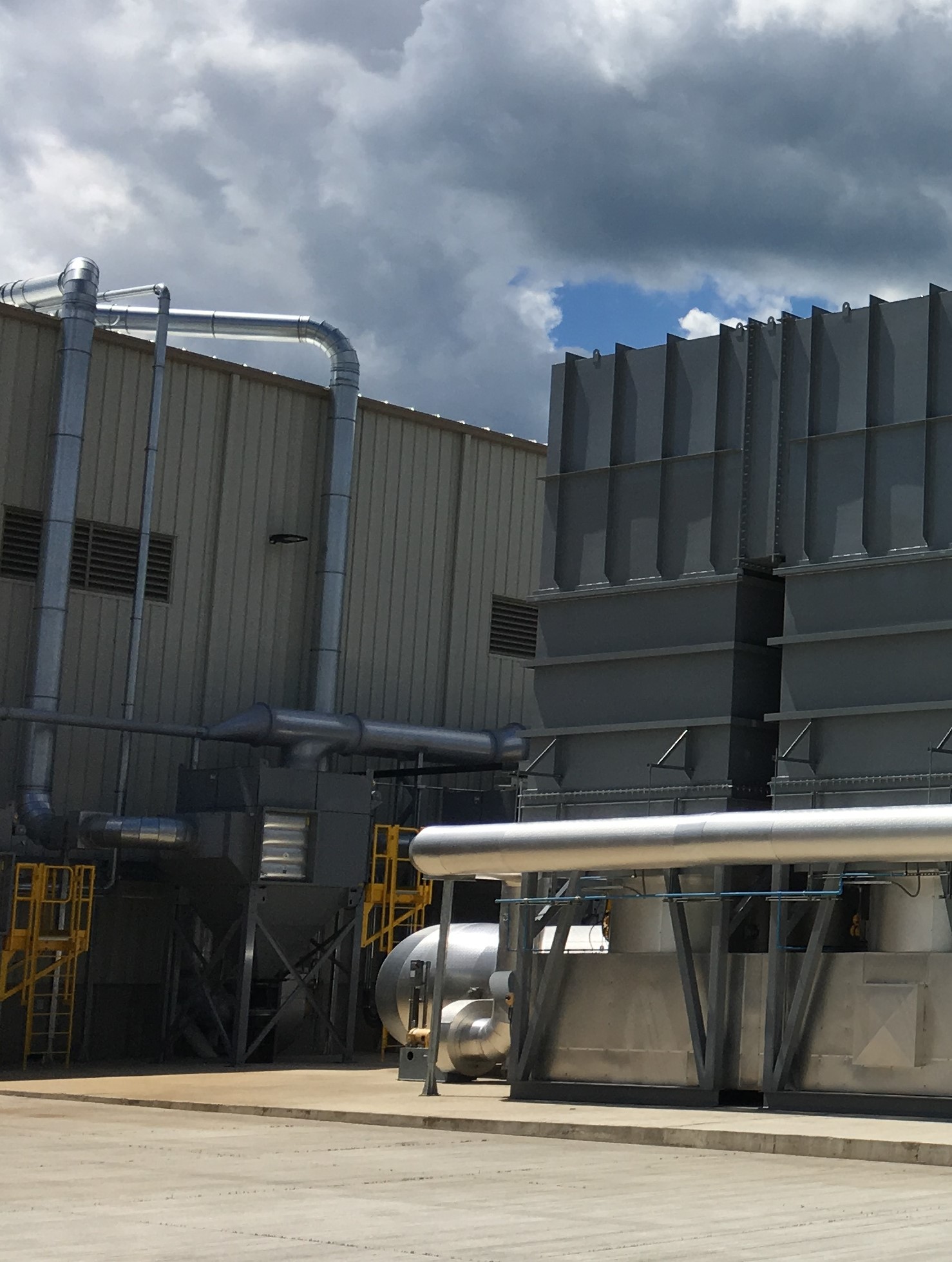 Industrial odor and emissions control equipment with stainless steel ducting.